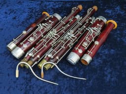 Pair of Wood Bassoons Schreiber Serial #4049 and Schreiber Serial #5571 Pair of Wood Bassoons Schreiber Serial #4049 and Schreiber Serial #5571