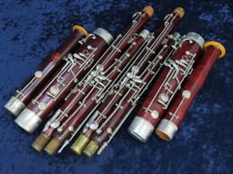 Pair of Wood Bassoons Schreiber Serial #4049 and Schreiber Serial #5571 Pair of Wood Bassoons Schreiber Serial #4049 and Schreiber Serial #5571