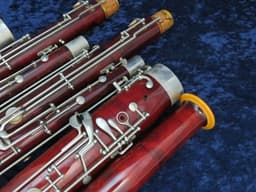 Pair of Wood Bassoons Schreiber Serial #4049 and Schreiber Serial #5571 Pair of Wood Bassoons Schreiber Serial #4049 and Schreiber Serial #5571