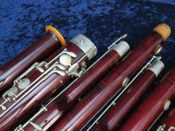 Pair of Wood Bassoons Schreiber Serial #4049 and Schreiber Serial #5571 Pair of Wood Bassoons Schreiber Serial #4049 and Schreiber Serial #5571